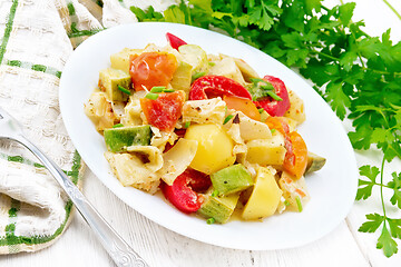 Image showing Ragout vegetable with zucchini on light board