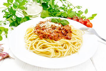 Image showing Spaghetti with bolognese on white board