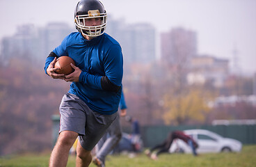 Image showing american football team in action