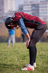 Image showing american football player resting after hard training