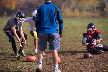 Image showing american football team in action