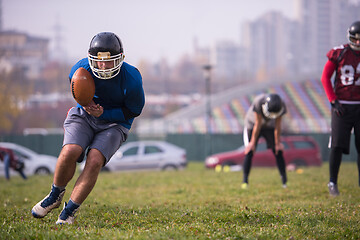 Image showing american football team in action