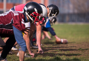 Image showing american football team in action