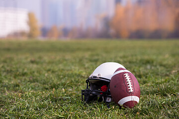 Image showing American football helmet and ball