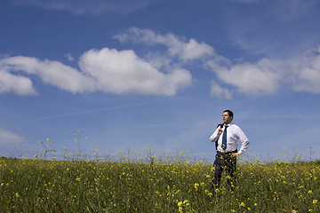 Image showing businessman enjoying a hot summer day