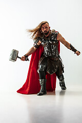 Image showing Man in cosplaying Thor isolated on white studio background