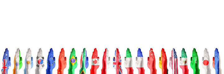 Image showing Hands colored in flags of participating countries of The Group of Twenty