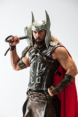 Image showing Man in cosplaying Thor isolated on white studio background