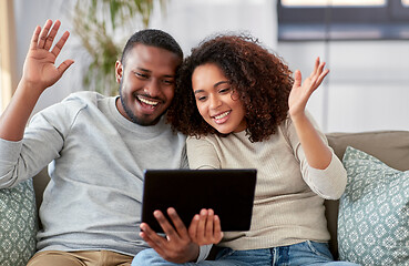 Image showing african couple with tablet pc having video call