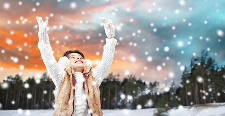 Image showing happy little girl enjoying winter and snow