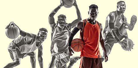 Image showing Full length portrait of a basketball player with the ball