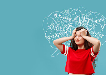 Image showing Young caucasian woman with mixed thoughts