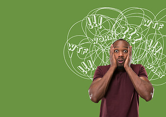 Image showing Young african-american man with mixed thoughts