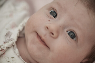 Image showing happy newborn little baby smilling