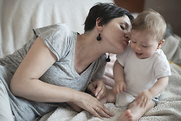 Image showing mother is playing with baby at home