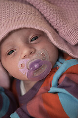 Image showing One month newborn baby sleeping in bed