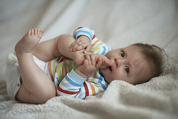 Image showing cute little newborn baby smilling