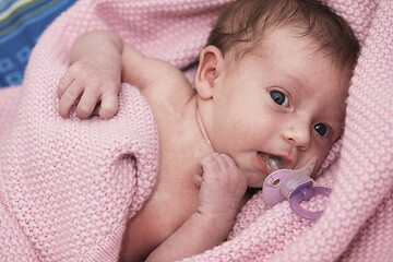 Image showing One month newborn baby sleeping in bed