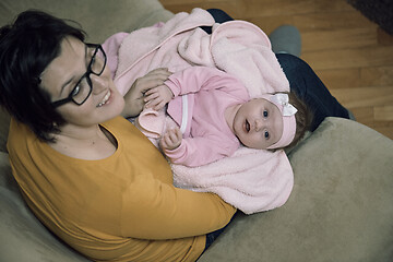 Image showing mother is playing with baby at home