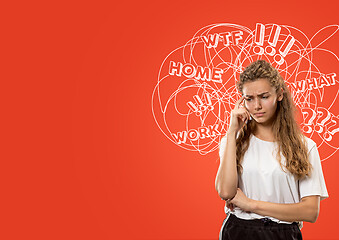 Image showing Young caucasian woman with mixed thoughts