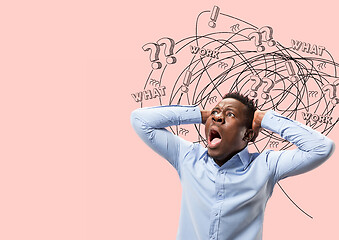 Image showing Young african-american man with mixed thoughts