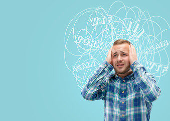 Image showing Young caucasian man with mixed thoughts