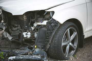 Image showing Broken and crashed modern car after an accident on street