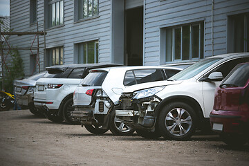 Image showing Broken and crashed modern car after an accident on street