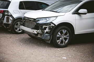 Image showing Broken and crashed modern car after an accident on street