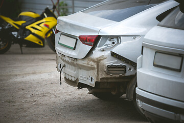 Image showing Broken and crashed modern cars after an accident on street