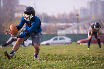 Image showing american football team in action