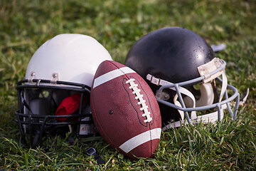 Image showing American football helmets and ball