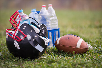 Image showing American football helmet and ball