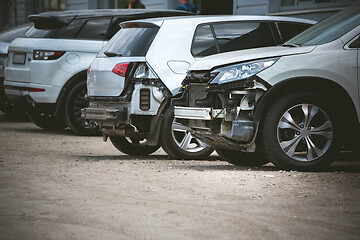 Image showing Broken and crashed modern car after an accident on street