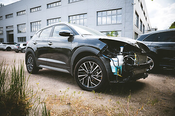 Image showing Broken and crashed modern car after an accident on street