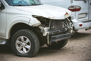 Image showing Broken and crashed modern car after an accident on street