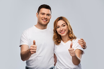 Image showing portrait of happy couple in white t-shirts