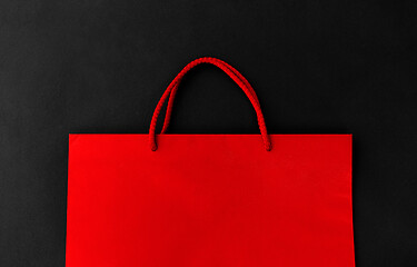 Image showing red shopping bag on black background