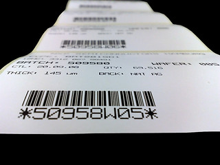 Image showing Roll of labels with the printed bar codes and figures.