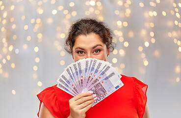 Image showing happy woman holding euro money banknotes