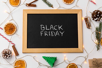 Image showing chalk board with black friday words on christmas