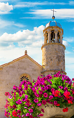 Image showing Church and flowers