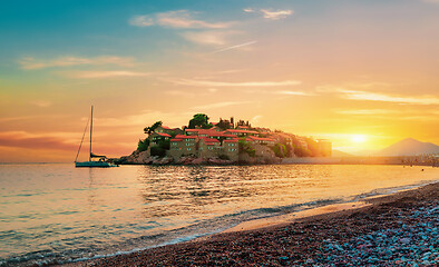 Image showing Island in sea at sunset