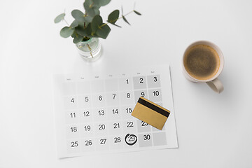 Image showing black friday on calendar, credit card and coffee