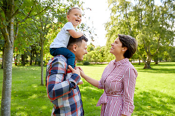 Image showing happy family having fun at summer park