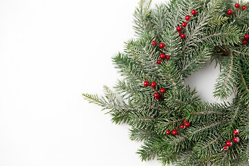 Image showing christmas wreath of fir branches with red berries