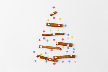 Image showing christmas tree of cinnamon sticks and sprinkles