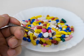 Image showing Tablets in a spoon