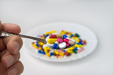 Image showing Tablets in a spoon