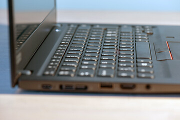 Image showing Macro shot of laptop with black keyboard